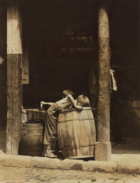 Two Young Brothers Picking Discarded Fruit out of Barrels near 14th Street, New York City, New York, USA, Lewis Hine for National Child Labor Committee, July 1910
