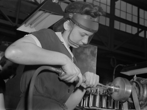 Female Worker Operating Compressed Air Machine at Midwest Aircraft Motor Plant, Ann Rosener, Office of War Information, August 1942