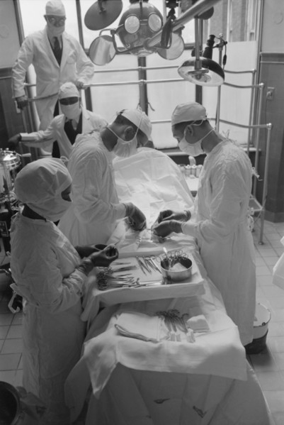 Surgeons Performing Surgery in Operating Room, Provident Hospital, Chicago, Illinois, USA,