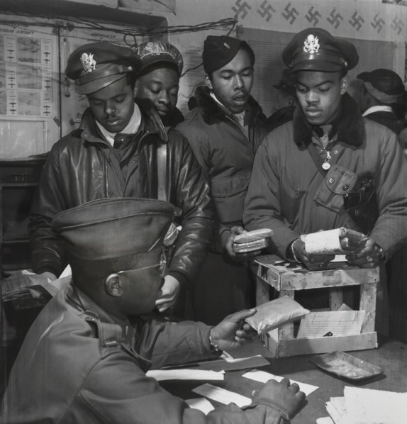 Cyanide "Escape Kits" Being Distributed to Fighter Pilots at Air Base, Seated: Theodore G. Lumpkin, Jr., Standing (left to right): Joseph L. "Joe" Chineworth, Memphis, TN, Class 44-E; Robert C. Robins...