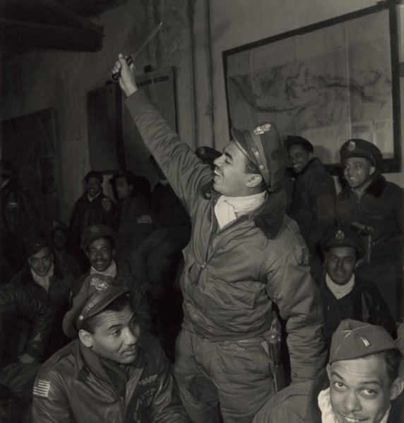 Members of 332nd Fighter Group in Briefing Room, Foreground (left to right) Gentry E. Barnes, Lawrenceville, IL, 44-D; Samuel W. Watts, Jr., New York, NY, 44-E; Wendell M. Lucas, Fairmont Heights, MD,...