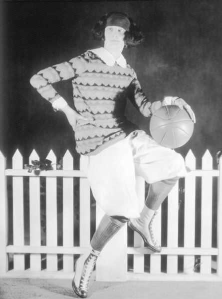 Women Dressed in Sports Attire and Holding Ball