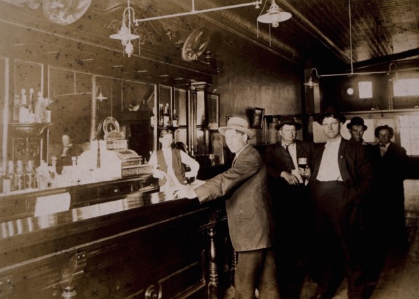 Men Drinking in Bar, USA, circa 1910