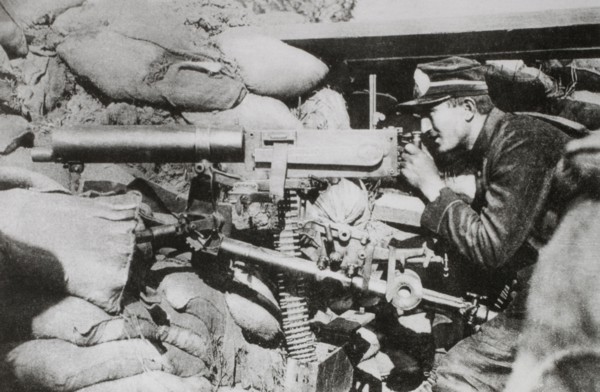 Belgian Machine Gunner in Position in Trenches, World War I, 1915