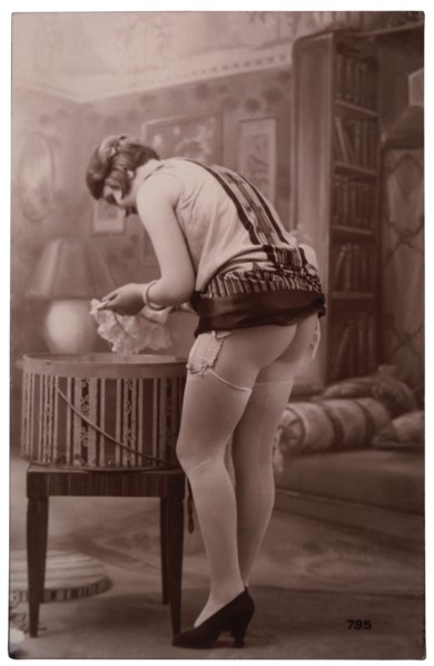 French Lingerie Model Leaning Over Hatbox, 1920