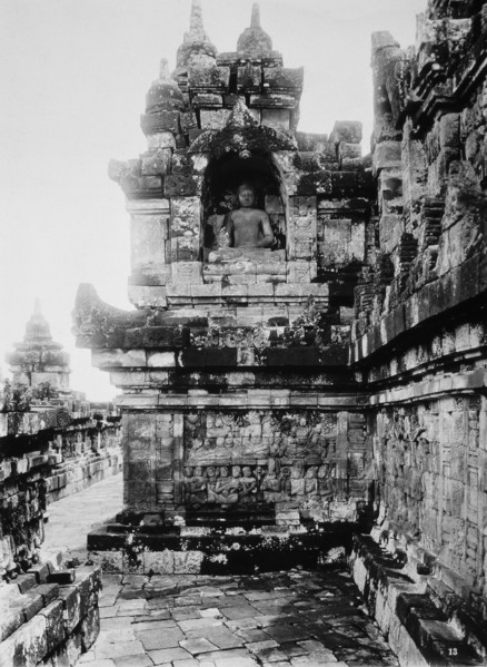 Statue of Buddha on First Platform, Borobudur Temple, Java, Indonesia, circa 1900