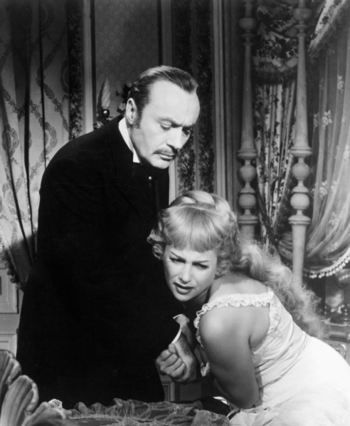Charles Boyer and Martine Carol, on-set of the Film, "Nana" directed by Christian-Jaque, 1955