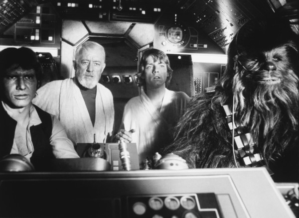 Peter Mayhew, Harrison Ford, Alec Guinness and Mark Hamill, on-set of the Film, "Star Wars", 1977
