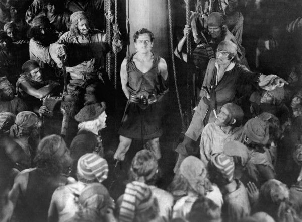 Douglas Fairbanks, (center), on-set of the Silent Film, "The Black Pirate", 1926