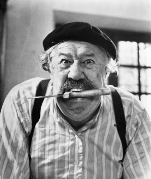 Michel Simon, Publicity Portrait with Knife between Teeth, on-set of the French Film, "The Two of Us" (aka Le Vieil Homme et L'Enfant), 1967