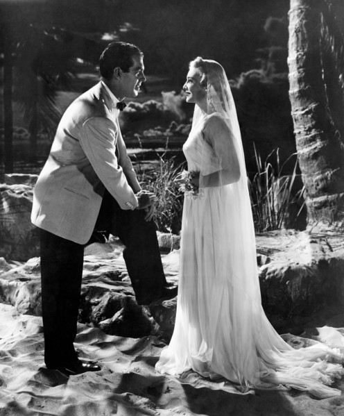 Fred MacMurray, Madeleine Carroll, on-set of the Film, "Honeymoon in Bali", 1939