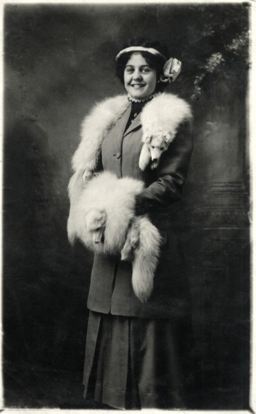 Smiling Woman Wearing Fox Fur Stole and Hand Muff, Portrait, circa 1918