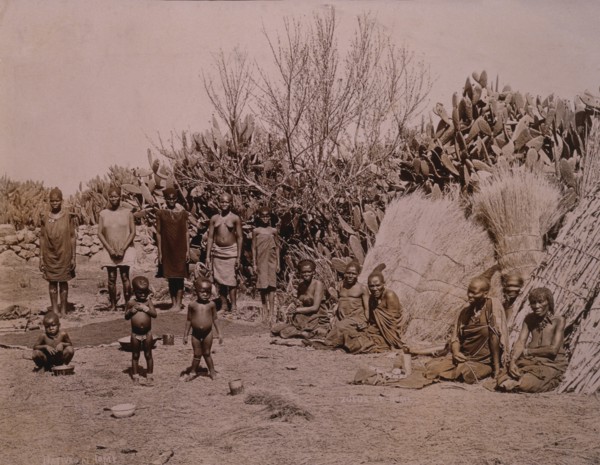 Group of Zulus in Village, Africa, circa 1890