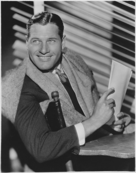Richard Arlen, Smiling Portrait Sitting in Director's Chair, Publicity Portrait for the Film, "Hot Saturday", 1932