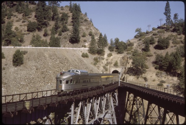 California Zephyr Train Exiting Tunnel on Elevated Track, California, USA, 1964