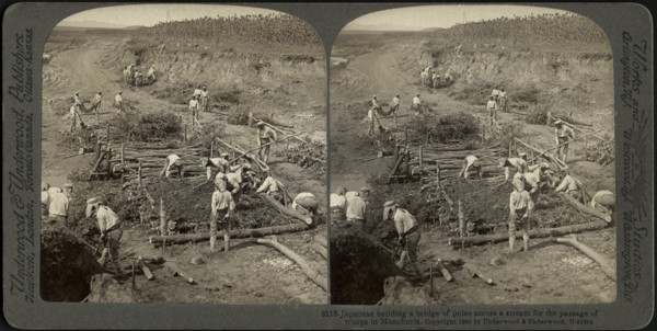 Japanese building a bridge of poles across a stream for the passage of troops in Manchuria, Stereo Card, Underwood & Underwood, 1906