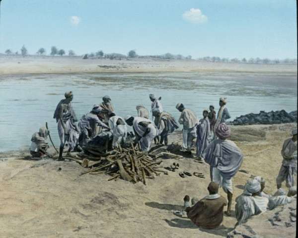 Corpse on Pyre, Hindu Funeral, Lower Ganges, Uttar Pradesh, India, Hand-Colored Magic Lantern Slide, Newton & Company, 1930