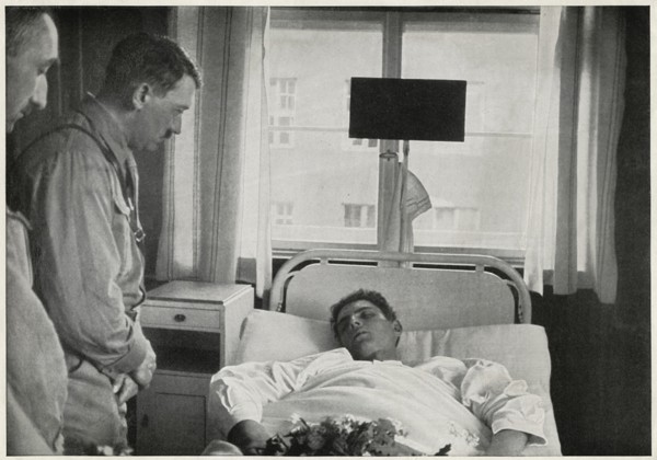 Adolf Hitler visiting Injured Man in Hospital, Germany, 1931