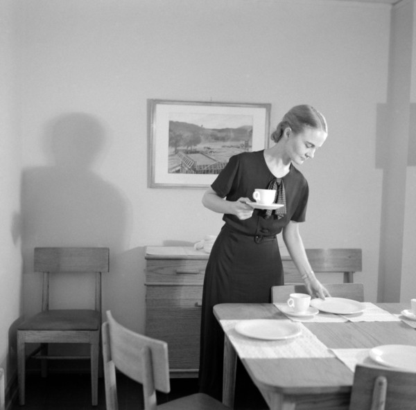 Woman Setting Table, Interior of Completed House, New Deal Cooperative Community, Greenbelt, Maryland, USA, Arthur Rothstein, Farm Security Administration, November 1936