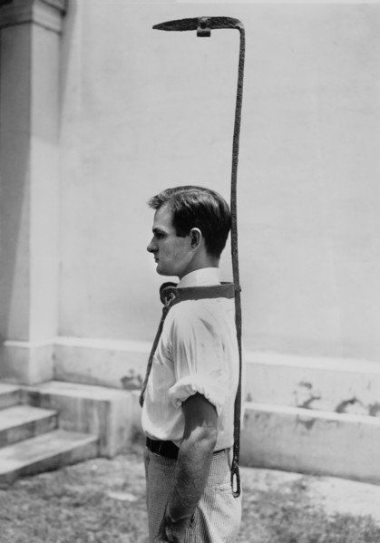Richbourg Gailliard, assistant to the director of the Federal Museum, Demonstrates the use of a Bell Rack, a Contraption used by Slave Owners to guard a Runaway Slave, originally topped by a bell, whi...
