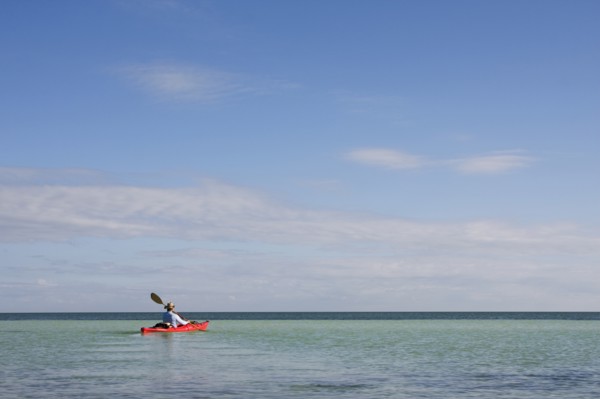 Man Kayaking on Ocean, Florida Keys, USA