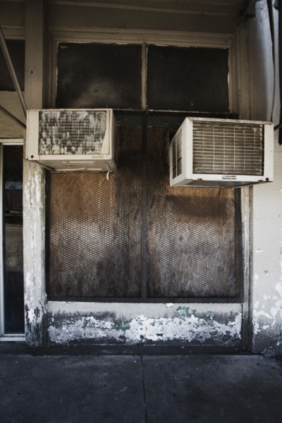 Air Conditioning Units Jutting Out onto Sidewalk, Leland, Mississippi, USA
