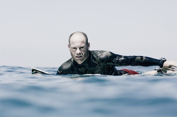 Surfer Preparing to Catch a Wave