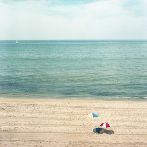 Two Umbrellas on Sandy Beach with Ocean in Background, High Angle View, Los Angeles, California, USA