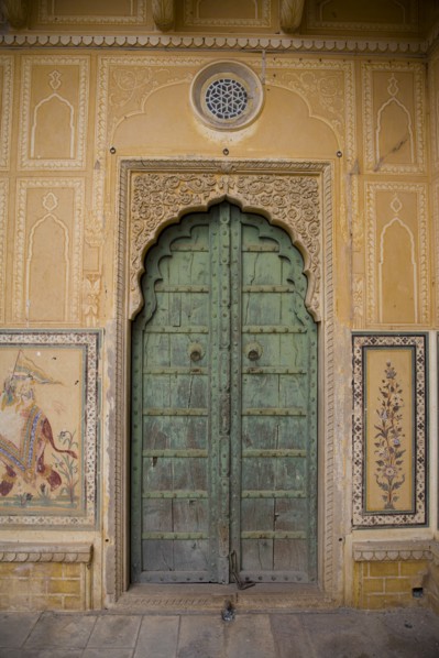 Old Green Door and Decorative Doorway