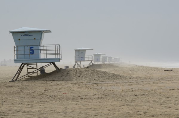 Lifeguard Towers on Foggy Beach, Huntington Beach, California, USA