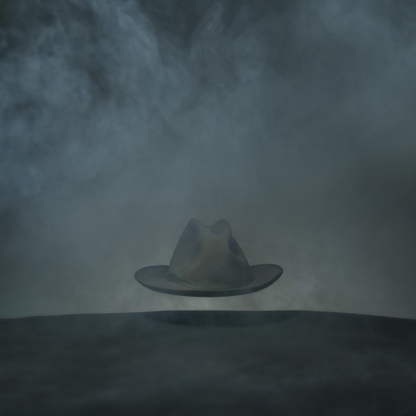 Wide-Brimmed Hat Floating in Fog