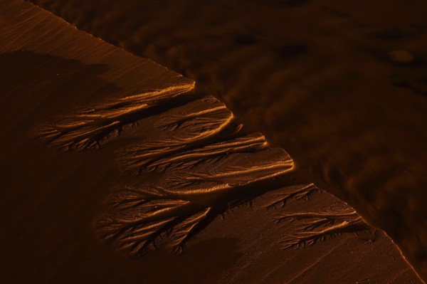 Water Making Pattern in Beach Sand