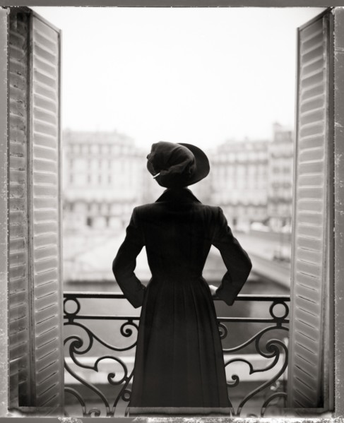 Woman Standing on Balcony, Rear View, Paris, France,