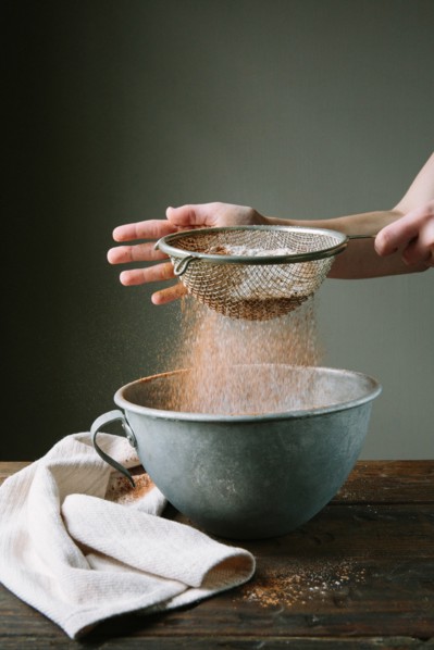 Flour and Cake Mix Being Sifted into Bowl