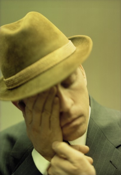 Man with Hand on Face