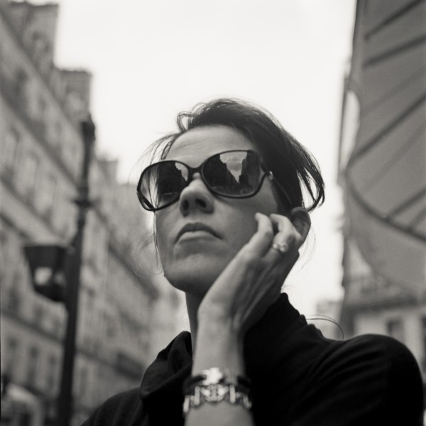 Woman Wearing Dark Sunglasses, Portait, Low Angle View, Paris, France