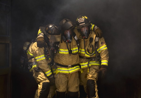 Firemen Helping One Another