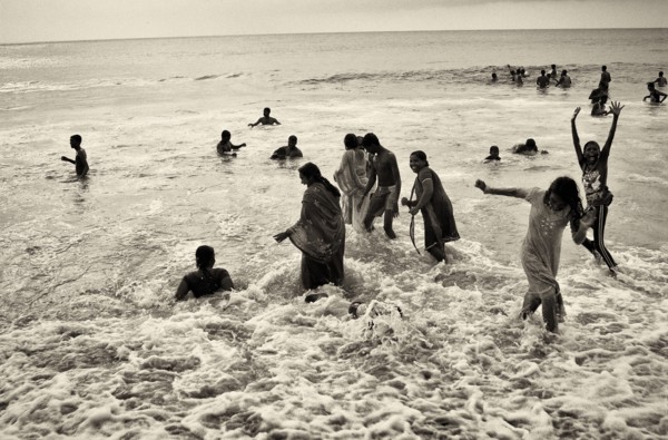 Group of People Playing in Ocean, India