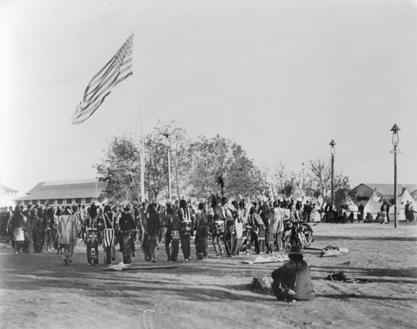 Ghost Dance, Cheyennes & Arapahoes in Circle around Flagpole, Indian Congress of the Trans-Mississippi and International Exposition, by Adolph F. Muir, F.A. Rinehart, 1898