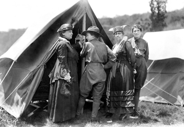Mary Dimmick Harrison, wife of President Benjamin Harrison and her daughter Elizabeth Harrison Walker with Mrs. Green and probably her daughter, Helen standing at tent of Emergency Services Corps camp...