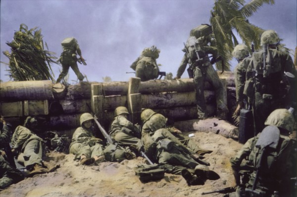 U.S. Marines Climbing over Coconut Log Seawall during Battle of Tarawa, Tarawa Atoll, Gilbert Islands, November 1943