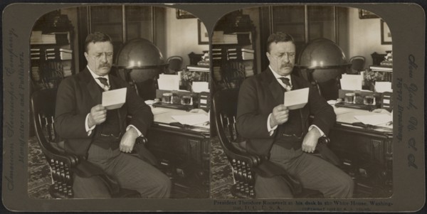 President Theodore Roosevelt at his desk in the White House, Washington, D.C., USA, Stereo Card, R.Y. Young, American Stereoscopic Co., 1903