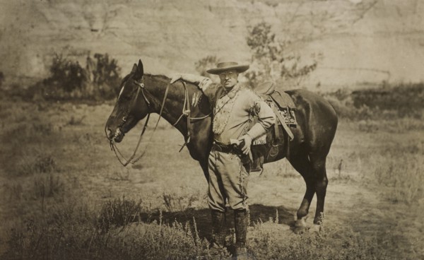Full-Length Portrait of Theodore Roosevelt Standing Alongside Horse, Wearing Cowboy Outfit, Photograph by T.W. Ingersoll, 1910