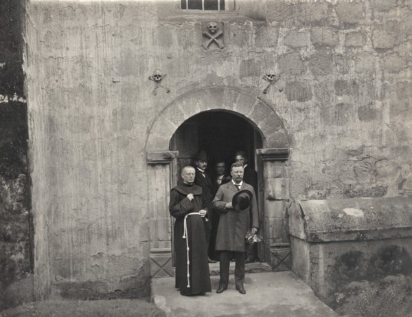 U.S. President Theodore Roosevelt standing with Clergyman outside a building at Santa Barbara Mission, Santa Barbara, California, USA, Photograph by J.E. Rainey, May 9, 1903