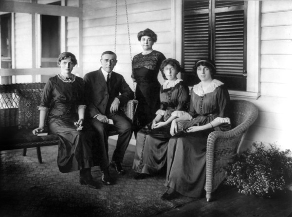 New jersey Governor Woodrow Wilson, Full-Length Portrait Seated on Porch Swing of his Summer Home, alongside first wife Ellen Axson Wilson and Three Daughters, L-R: Jessie, Margaret and Eleanor, Sea G...