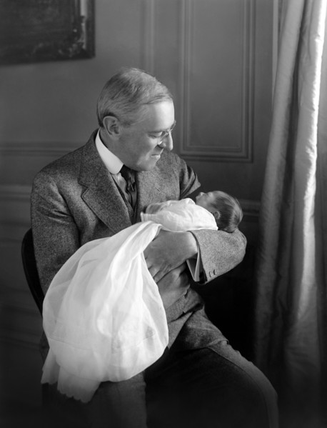 U.S. President Woodrow Wilson holding his Grandson Francis Bowes Sayre Jr, Photograph by Harris & Ewing, 1915