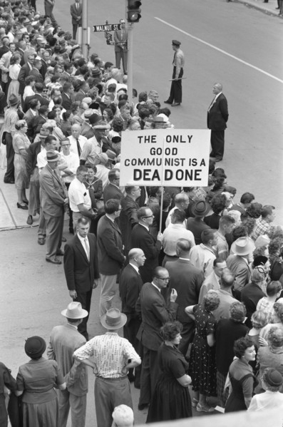 Crowd gathered on Street to see Soviet Leader Nikita Khrushchev, Man holding Sign "The only Good Communist is a Dead Communist", Des Moines, Iowa, USA, photograph by Thomas J. O'Halloran, September 19...