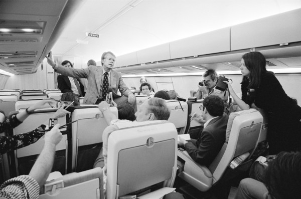 Democratic Presidential Nominee Jimmy Carter holding an informal Press Conference aboard "Peanut One" Campaign Airplane on Campaign Trip, photograph by Thomas J. O'Halloran, September 11, 1976
