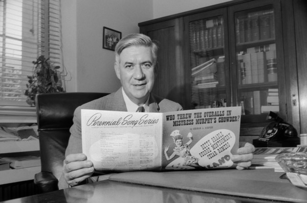 Massachusetts Congressman Thomas P. "Tip" O'Neill, Half-Length Portrait sitting at Office Desk and holding Sheet Music, Washington, D.C., USA, photograph by Thomas J. O'Halloran, August 1957
