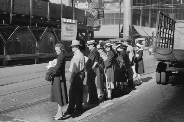 Group of People waiting for Street Car